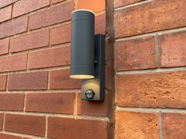 Outdoor wall light with PIR sensor, typical of our electrical installations in Birmingham