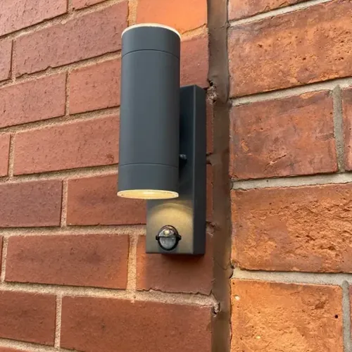 Outdoor wall light with a PIR sensor, the kind of garden lighting our Moseley electrician installs