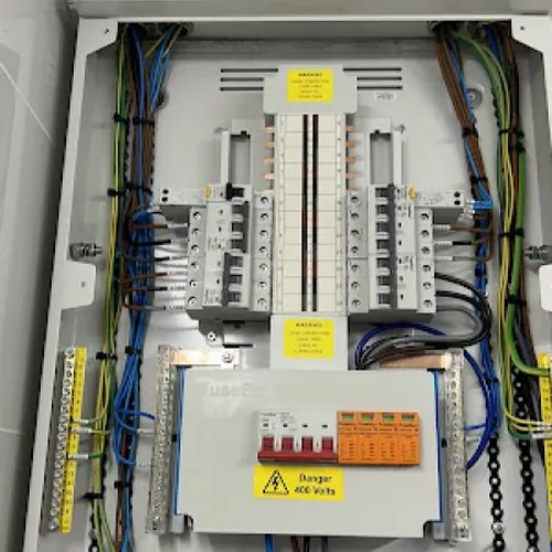 Three-phase distribution board with surge protection and neatly dressed cables